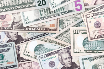 Background of many dollar bills. The concept of economy, business, world currency, money.
