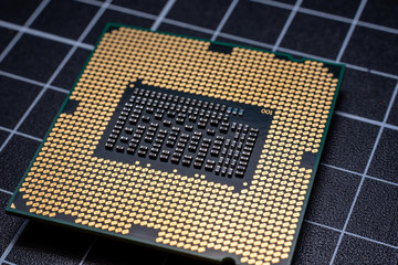 looking close up at the cpu socket gold plates on the cpu