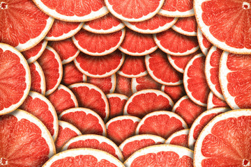 Creative background made of summer tropical fruit grapefruit. Flat lay, top view, copy space