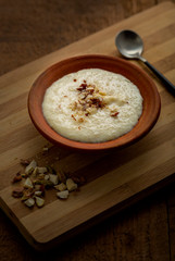 Phirni, a traditional and delicious indian style milk and rice based creamy dessert, served in clay pot
