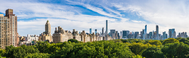 Fototapeta na wymiar Central park,new york,usa. 09-01-17: central park with Manhattan skyline on the sunny day in summer season.