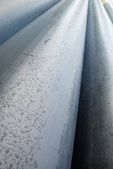 Gray metal pipes (tubes) surface