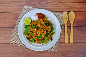 Stir fried flat noodle and pork with preserved soy bean paste. Ready to serve.