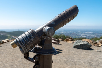 Telescope on the summit of the Double Peak Park in San Marcos. 200 acre park featuring a play area and hiking trails that lead to a summit. © Unwind