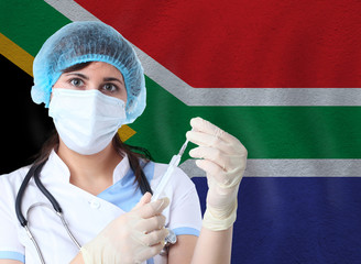 Scientist woman with test tube Coronavirus or COVID-19 against Republic of South Africa flag. Research of viruses in laboratory for prevention of a pandemic in Republic of South Africa