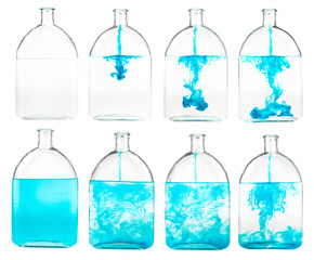 set of blue ink solutions in glass flask isolated