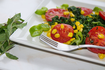 spinach, tomato and corn salad, healthy diet concept