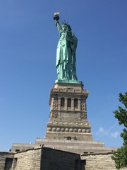 Fototapeta na wymiar The Liberty statue of New York City at the sun light