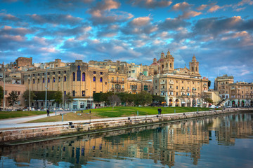 Fototapeta na wymiar Beautiful architecture of the Birgu town at sunset, Malta