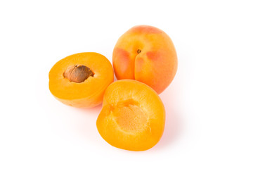 Ripe apricots on light background