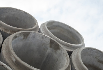 Stack of new concrete pipes.