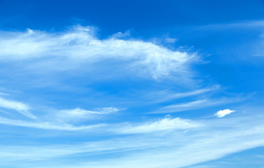 Naklejka na ściany i meble Sunny background, blue sky with clouds