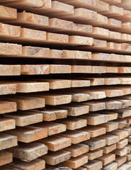 Wooden planks. Air-drying timber stack.