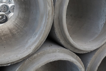 Stack of new concrete pipes.
