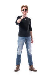 Happy young confident red hair man showing thumbs up approval hand sign. Full body isolated on white background. 