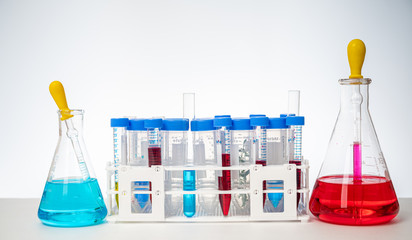 Any of the various tools and containers used in experiments on a white background.