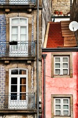 Old colorful tiled facades in Porto city