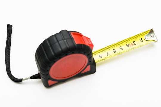 measuring tape measure red with mm division on a white background.