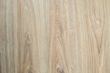 Naklejka premium Wooden brown textured floor or desk background and texture of Walnut wood decorative furniture surface