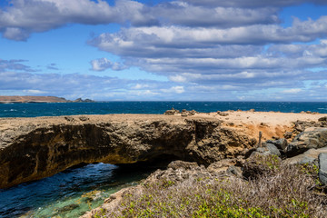 Fototapeta na wymiar View of the natural bridge on the coast of Aruba