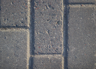 Grey paving slabs on the street