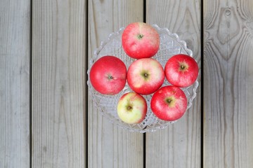 Red apples in a plate