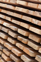 Wooden planks. Air-drying timber stack.