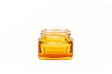 empty yellow glass jar