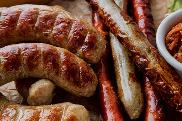 Sausages on a grilled plate