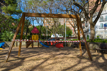 Fototapeta na wymiar Playgrounds and parks for children closed due to the coronavirus during the quarantine period,