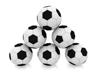 Black and white soccer ball pyramid on a white background