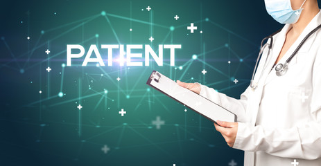 Doctor fills out medical record with PATIENT inscription, medical concept