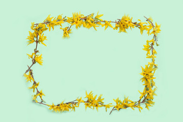 frame of yellow flowers on a green background. Hello summer time banner. Fashionable texture. The holiday season, weekends, holidays, logo. Happy summer day. copy space