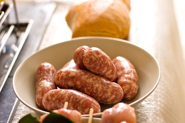 Italian sausages in a white dish (Pesaro, Italy, Europe)
