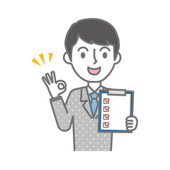 チェックリストを持ったビジネスマン