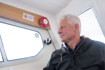 Portrait of a captain in his boat's cabin © viktor holm