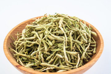 Wild honeysuckle buds dried on white background