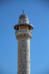 A Mosque tower with blue sky, Israel