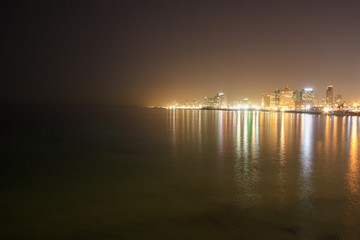 Fototapeta na wymiar Tel Aviv skyline at night from Jaffa
