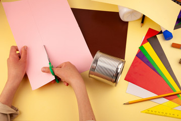 Step 10. Step-by-step instructions on how to make a stand for stationery from recycled materials....