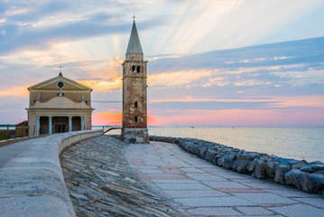 sunrise in Caorle Italy Caorle promenade, lighthouse