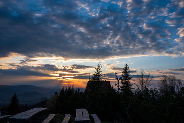 cottage on top of the mountain at sunrise in Beskydy Javorovy vrch, czech 13.4.2020