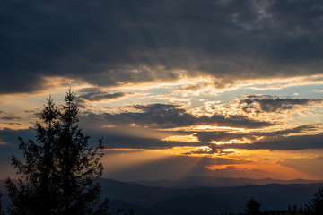 sunrise with beautiful sky and silhouette of landscape, czech beskydy