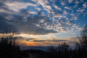 sunrise with beautiful sky and silhouette of landscape, czech beskydy