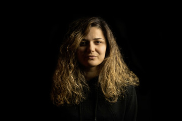 a beautiful girl portrait on black background