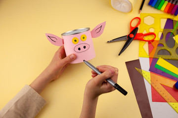 Step 27. Step-by-step instructions on how to make a stand for stationery from recycled materials....
