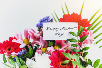 Happy mother's day in a beautiful bouquet of flowers 