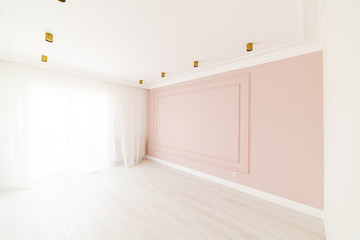 Interior photos for designers and employees. Room with LED lighting and pink wall. Bright room for family, housing and recreation