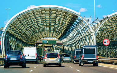 Car traffic in tunnel bridge in Warsaw in Poland reflex