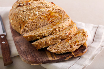 Apricot and oat wholemeal bread, sliced